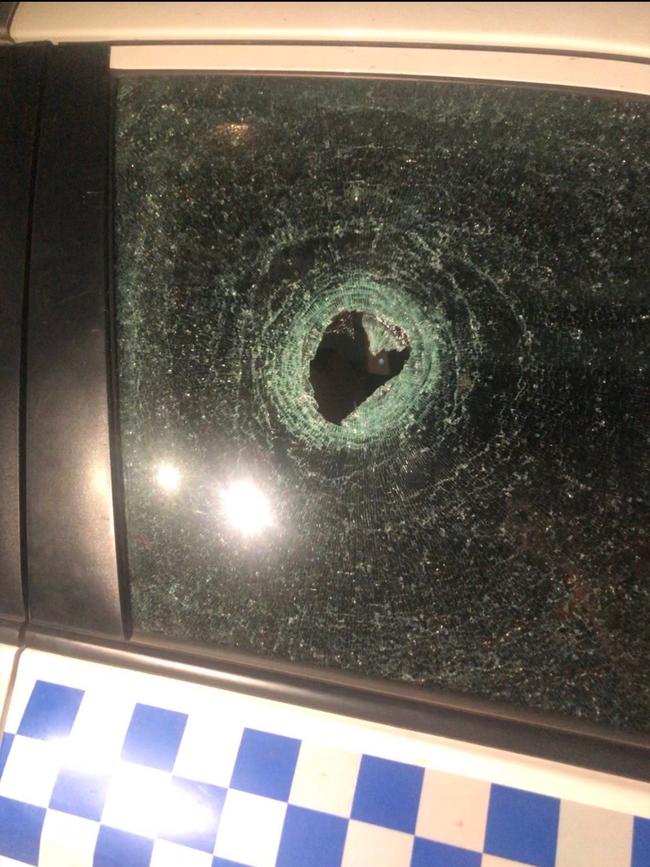 The damage to the police vehicle when a rock was thrown at it during a patrol in Moree overnight. Picture: Supplied