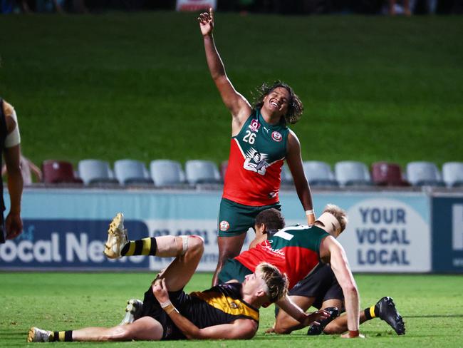 South Cairns Cutters' Joseph Ugle celebrates victory after kicking the final goal of the game in the AFL Cairns men's grand final match defeating the North Cairns Tigers at Cazalys Stadium, Westcourt. Picture: Brendan Radke