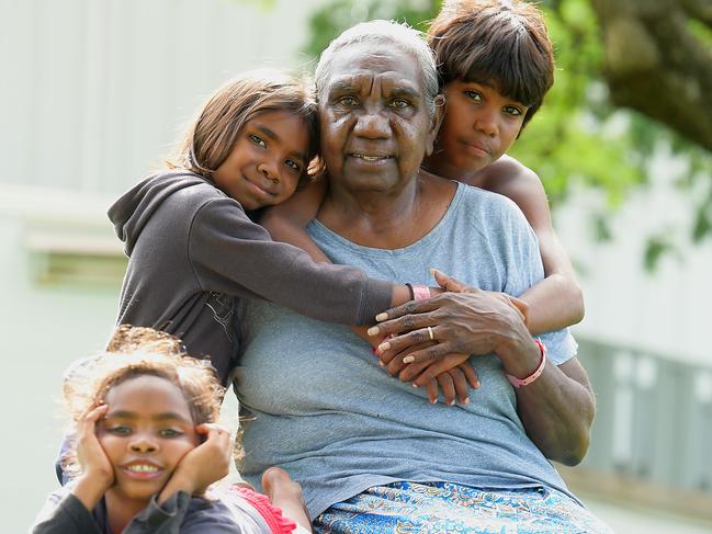 Community Elder, Miriam-Rose Baumann with Tynisha Cronin, Timena Cronin  and Darryl Marrana wait for word to return to Daly Waters after flood waters subside.Picture by Patrina Malone