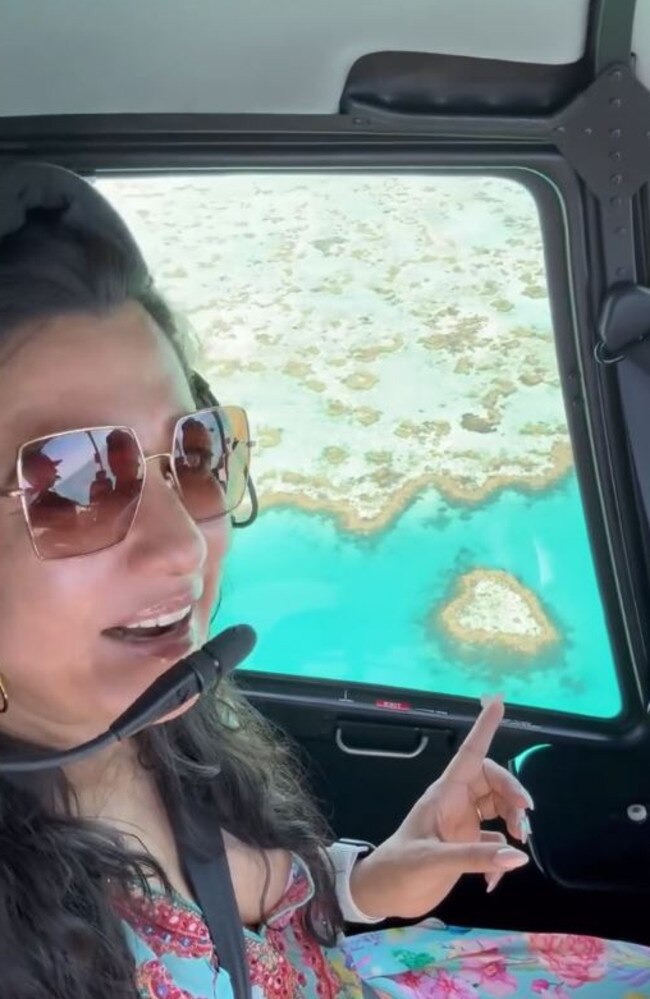 Bollywood star and Indian television presenter Mini Mathur flies over the Great Barrier Reef. Picture: Instagram