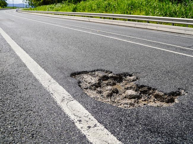 Road Tek crews are busy patching potholes along the Bruce Highway after January 2023 rainfalls closed the road at several points including at Bowen and Proserpine. Picture: Heidi Petith