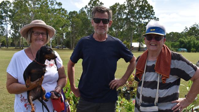 Katie, Rod, Liz and dog Annie checking out one of the market stalls in Glenwood on Australia Day.