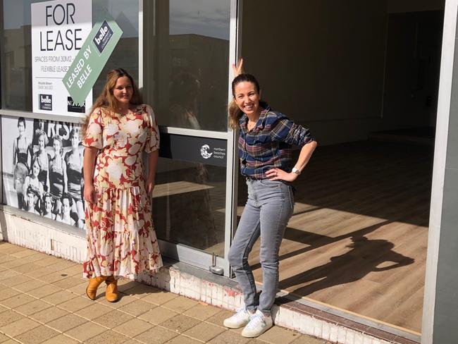 Irene Falcone, right, of Sans Drinks outside her first non-alcoholic bottle shop at Freshwater in 2021. On the left is Brook Mahoney of the Better Brand Co who helped with the shop fit-out. Picture: Julie Cross