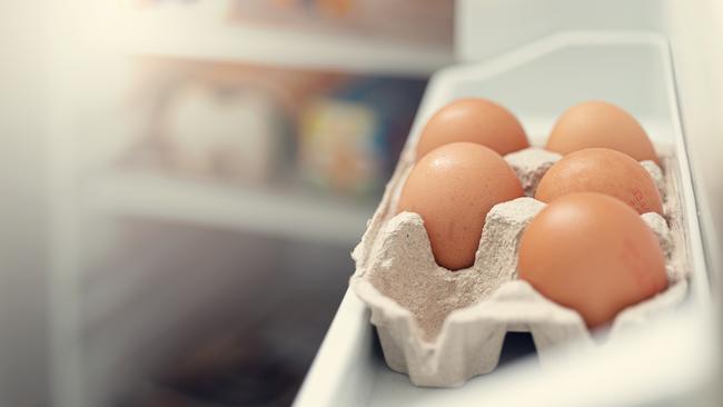 Close-Up Of Eggs In Refrigerator