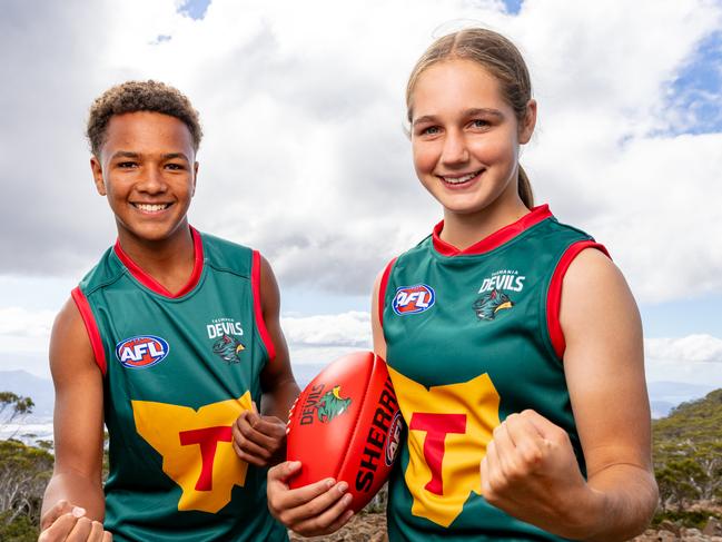 Tasmania Football Club Launch. Shaun Kongwa and Mia Barwick sporting the new Tasmania Devils jumpers. Picture: Linda Higginson / Tasmania Football Club***NO ON SALES... WE DO NOT OWN THE COPYRIGHT***