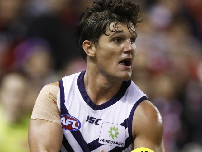 Lachie Shultz of the Dockers runs with the ball during the Round 21 AFL match between the St Kilda Saints and the Fremantle Dockers at Marvel Stadium in Melbourne, Sunday, August 11, 2019. (AAP Image/Daniel Pockett) NO ARCHIVING, EDITORIAL USE ONLY