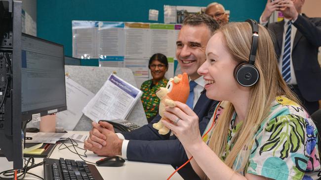 Virtual services nurse consultant Izzy Taylor and Premier Peter Malinauskas in the Child and Adolescent Virtual Urgent Care Service based in the Women's and Children's Hospital. Picture: NCA NewsWire / Brenton Edwards