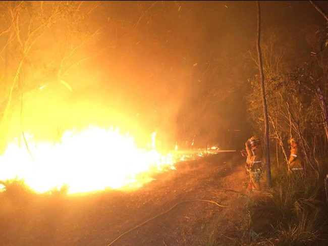 Firefighters work to control a blaze near Agnes Water.