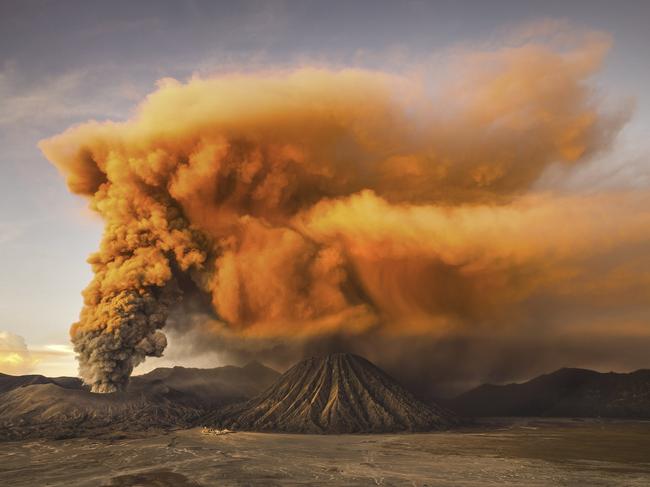 Mt. Bromo Mount Bromo volcano is a small, but active volcanic cinder cone on Java, Indonesia. Early 2016, I happened to be in Mt. Bromo during the increase of seismic activity and triggered the alert status to the second highest. Picture: Reynold Riksa Dewantara / National Geographic Travel Photographer of the Year