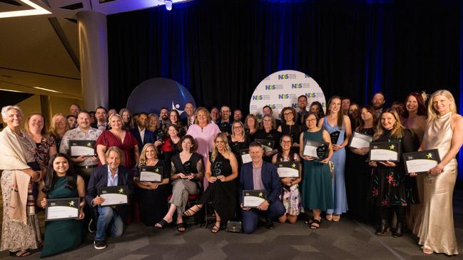 National Disability Award winners group shot, with SA Minister for Human Services, Nat Cook (centre, pink dress). Picture: Supplied