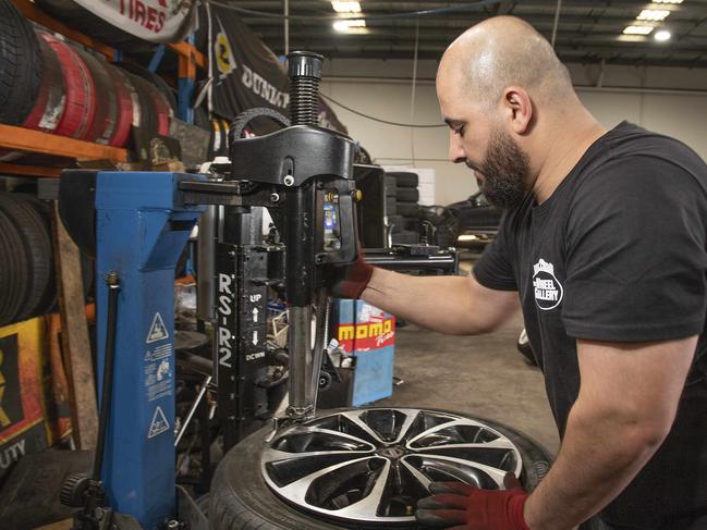 Youii working on a tyre. Picture: Ellen Smith