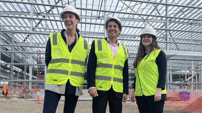 Moderna executives Chantal Friebertshaeuse, Michael Azrak and Arpa Garay at the company's new factory which is under construction in Melbourne.