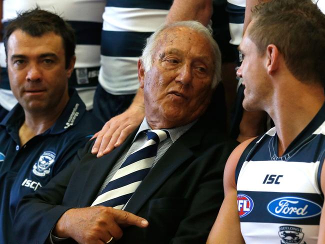 Former President Frank Costa speaks with Joel Selwood during the Geelong Cats 2014 team photo day at Simonds Stadium, Geelong on February 10, 2014. (Photo: Lachlan Cunnigham/AFL Media)