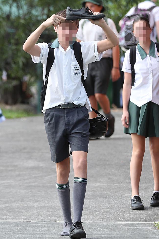 A student at The Gap High accentuates his footwear yesterday. Picture: Peter Wallis