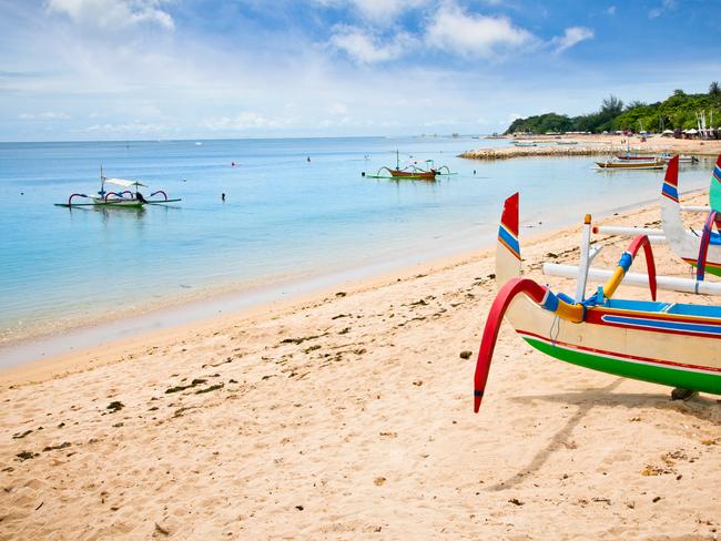 OCTOBER 26 2014 DEALS Traditional fishing boats on a beach in Nusa Dua on Bali. Indonesia.