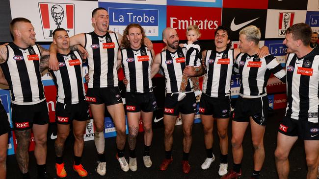 The Pies celebrate after another close one. Picture: AFL Photos/Getty Images