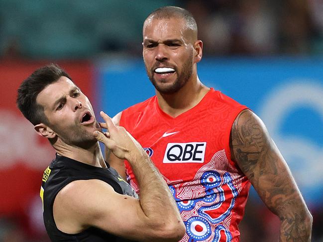 Sydney's Lance Franklin elbows Richmond's Trent Cotchin during the Marn Grook match for Sir Doug Nicholls Round between the Sydney Swans and Richmond Tigers at the SCG. Photo by Phil Hillyard (Image Supplied for Editorial Use only - **NO ON SALES** - Â©Phil Hillyard )