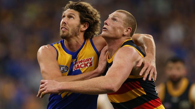 Tom Hickey of the Eagles and Sam Jacobs of the Crows contest the ruck during the round 21 match between the West Coast Eagles and the Adelaide Crows at Optus Stadium. Picture: Getty Images