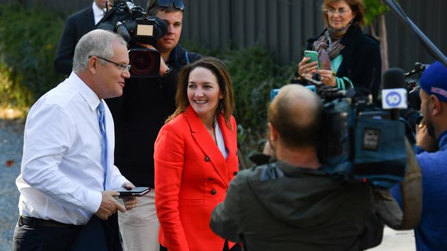 Prime Minister Scott Morrison and Liberal candidate for Mayo Georgina Downer arrive at GD Wholesale Fruit and Veg at Hawthorndene near Adelaide today. Picture: AAP