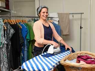 Laura Vee busy with a basket of ironing. Picture: Mike Knott BUN260719IRON1