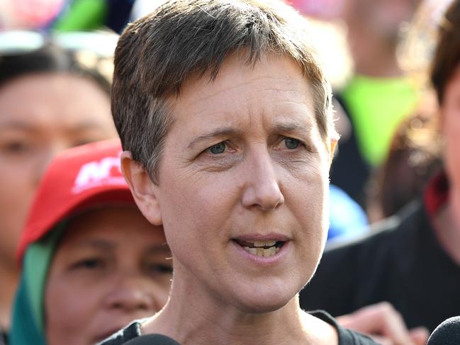 Australian Council of Trade Unions (ACTU) Secretary Sally McManus speaks to the media as union workers protest for better pay and more secure jobs in Melbourne, Wednesday, May 9, 2018. Thousands of workers have blocked off part of Melbourne's CBD, saying Prime Minister Malcolm Turnbull can keep the federal coalition's slated tax cuts for low- and middle-income workers. The rally on Wednesday is part of a nationwide campaign demanding better work conditions and pay. (AAP Image/Joe Castro) NO ARCHIVING