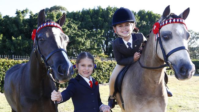 Indie and Chanelle are hoping to win some prize money at this years Gold Coast Show so they can buy some show bags. Picture: Tertius Pickard.