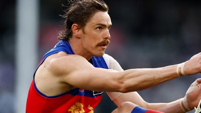 MELBOURNE, AUSTRALIA - AUGUST 17: Joe Daniher of the Lions kicks a goal during the 2024 AFL Round 23 match between the Collingwood Magpies and the Brisbane Lions at The Melbourne Cricket Ground on August 17, 2024 in Melbourne, Australia. (Photo by Michael Willson/AFL Photos via Getty Images)