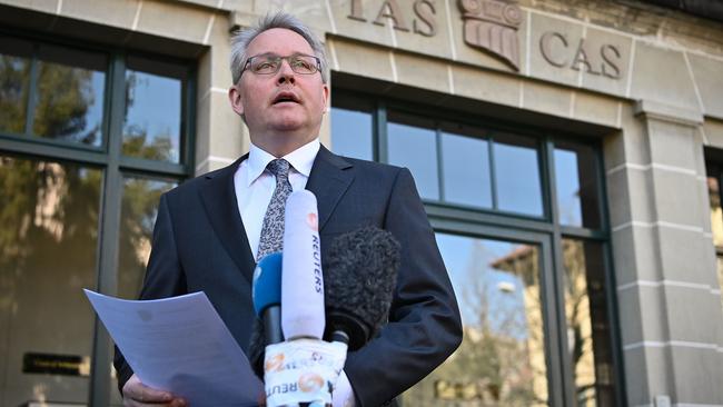 Court of Arbitration for Sport (CAS) Secretary General Matthieu Reeb reads Court’s ruling on Sun Yang on Friday. Picture: AFP