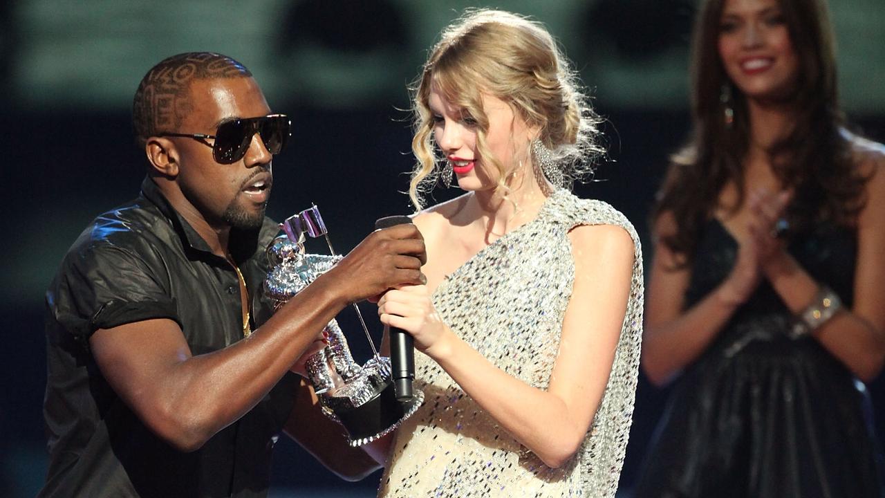 Kanye West jumps onstage after Taylor Swift won the Best Female Video award the 2009 MTV Video Music Awards. Picture: Christopher Polk/Getty Images