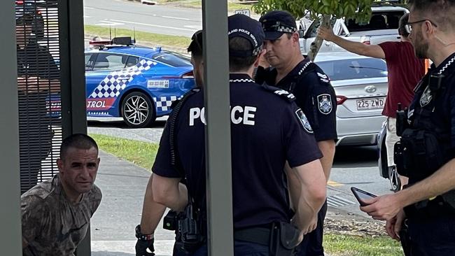 Police arrest a man allegedly spotted "driving erratically” before dumping a car at Pacific Pines and fleeing, sending nearby schools and kindergartens into lockdown. Picture: Kyle Wisniewski/Gold Coast Bulletin