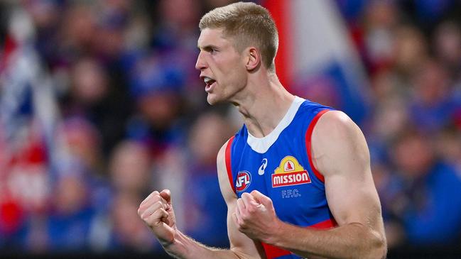 GEELONG, AUSTRALIA - AUGUST 26: Tim English of the Bulldogs celebrates a goal during the round 24 AFL match between Geelong Cats and Western Bulldogs at GMHBA Stadium, on August 26, 2023, in Geelong, Australia. (Photo by Morgan Hancock/Getty Images)