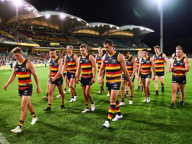 Adelaide Crows players leave the ground after the round three loss at the hands of the Geelong Cats at Adelaide Oval. Picture: Mark Brake/Getty 