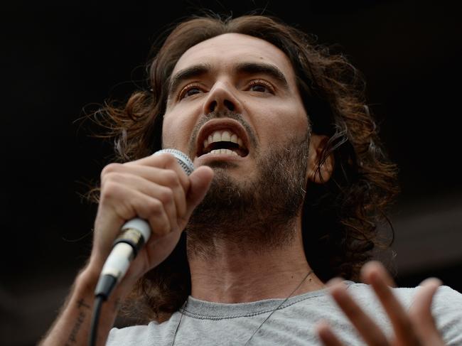 Russell Brand has increasingly aired conspiracy theories and accused media outlets of an “agenda” against him. (Photo by Mary Turner/Getty Images)