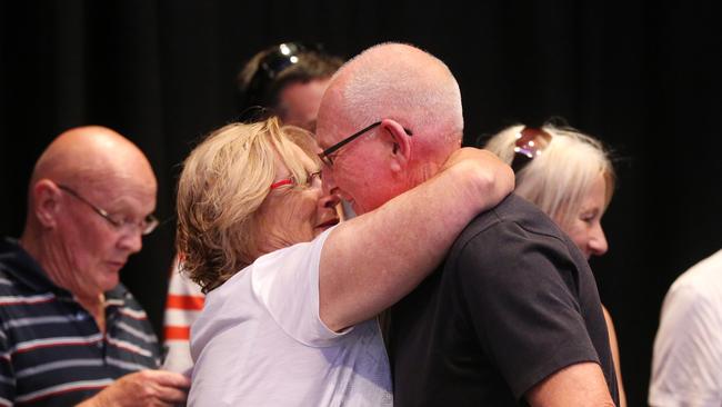 John Stone gets a kiss from wife Dell after buying the Woodgee St property at auction in 2013.