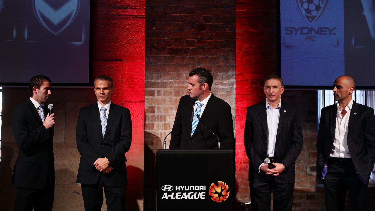 Simon Hill (centre) at the 2010-11 A-League season launch. (Photo by Matt King/Getty Images)