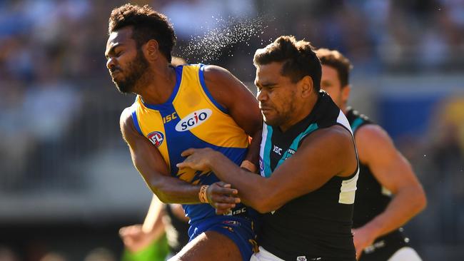 Willie Rioli of the Eagles clashes with Jake Neade of the Power on Saturday. Picture: Daniel Carson/AFL Media/Getty Images