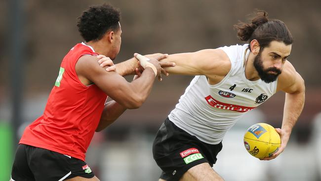 Brodie Grundy, right, posted another big SuperCoach ton against the Giants in Round 18.