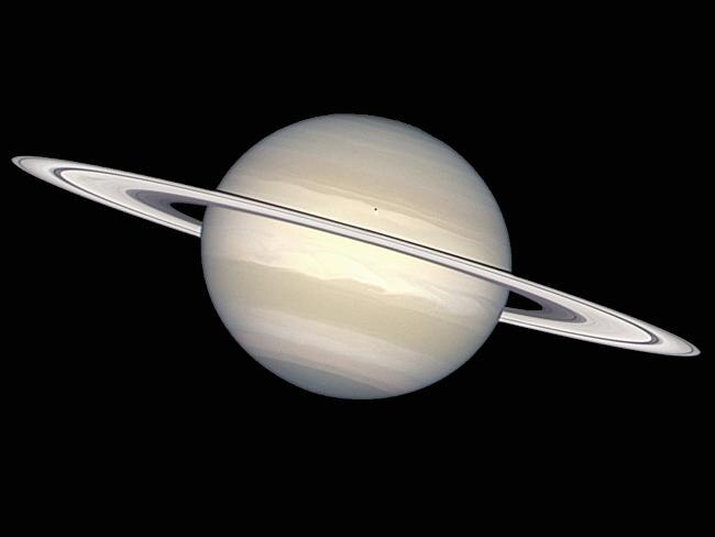 The NASA/ESA Hubble Space Telescope has provided images of Saturn in many colours, from black-and-white, to orange, to blue, green, and red. But in this picture, image processing specialists have worked to provide a crisp, extremely accurate view of Saturn, which highlights the planet's pastel colours.