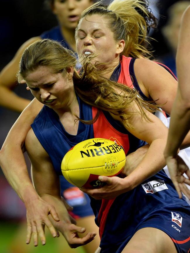 Reni Hicks is wrapped up in possession during the VFL Women’s grand final. Picture: Andy Brownbill.