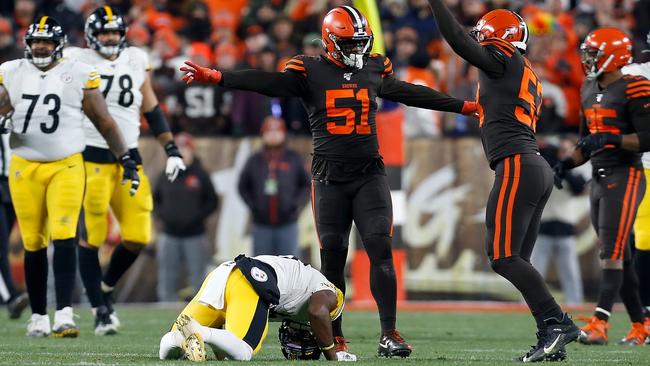 Pittsburgh’s JuJu Smith-Schuster goes down with concussion against Cleveland. 110 of 111 NFL players examined were found to have brain disease CTE. Picture: Getty Images