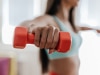 Dumbbells, kettlebells and ankle weights are the perfect minimal at-home gym equipment. Image: iStock. 