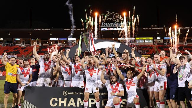 St Helens celebrate with the World Club Challenge trophy. (Photo by Mark Metcalfe/Getty Images)