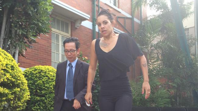 Cody Patricia Marie Roberts at Gladstone Magistrates Court with duty lawyer Jun Pepito in 2016. Photo Ross Irby/The Observer.