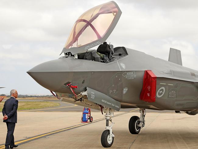 Malcolm Turnbull inspects a Joint Strike Fighter (JSF) F-35 at the Avalon Airshow in Melbourne. Picture: Scott Barbour.