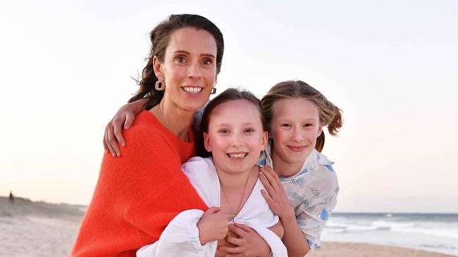 Ellie Degraeve with her daughters Grace and Harper. Picture: Patrick Woods.