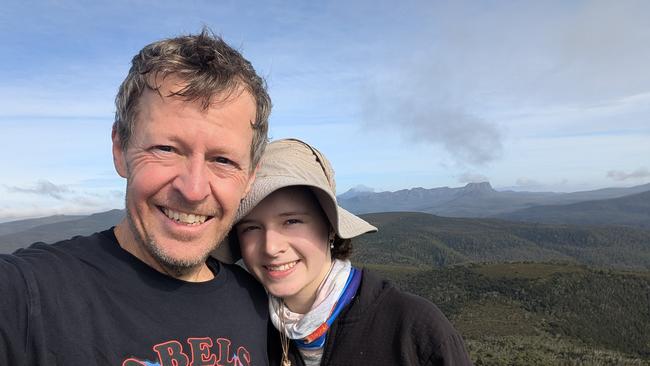 Nelly Brett with father Gavin Brett at Pyramid Mountain summit. Nelly Brett completed all 158 Tasmanian Abel mountains at age 17 years 11 months and 4 days old over an almost 10 year period. Picture: Gavin Brett