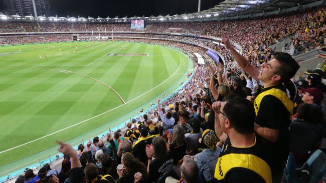 About 30,000 fans will be at the AFL's first night Grand Final at the Gabba.