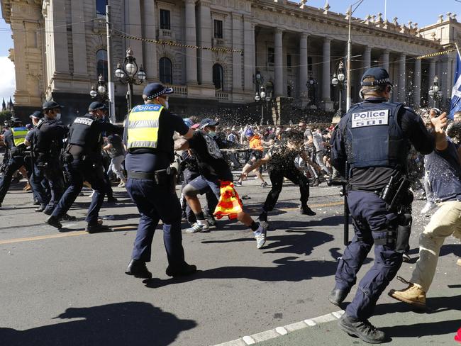 Police have used pepper spray to subdue rowdy protesters in Melbourne. Picture: Maxtrix Media Group