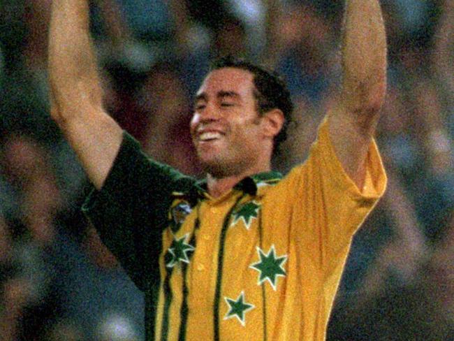 SYDNEY, AUSTRALIA - 1996:  Michael Bevan of Australia celebrates after hitting a four off the last ball to win the One Day International match played between Australia and the West Indies at the Sydney Cricket Ground, 1996 in Sydney, Australia. (Photo by Getty Images)