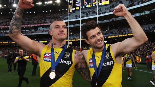 Dustin Martin and Trent Cotchin celebrate Richmond’s premiership win. Picture: Phil Hillyard